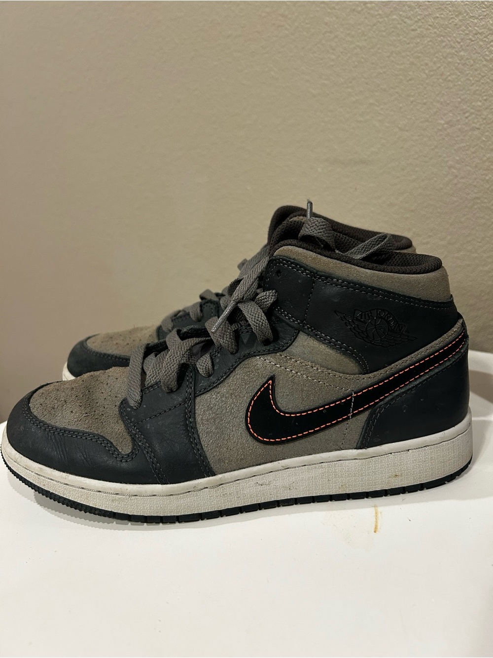 Nike air Jordan 1 mid SE “Night Stadium
 in Gray and Black with Orange Stitching
